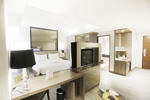 Junior Suite, 1 King Bed | Living area | LCD TV