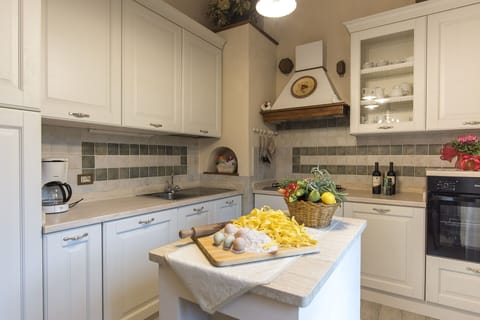 Cabinetry, Countertop, Property, Food, Kitchen Appliance, Building, Kitchen, Kitchen Stove, Interior Design, Home Appliance