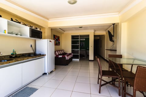 Comfort Apartment | Living area | 37-inch flat-screen TV with cable channels, pay movies