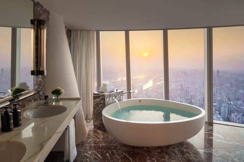 Premier King Room with River View | Bathroom | Combined shower/tub, hydromassage showerhead, designer toiletries