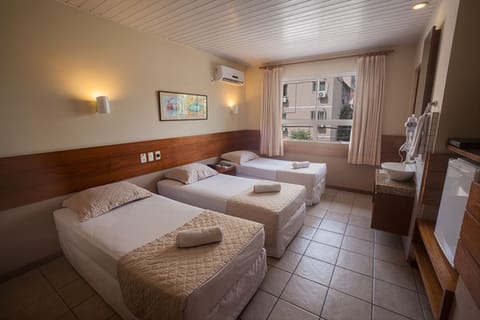Standard Triple Room | Minibar, in-room safe, free WiFi, bed sheets