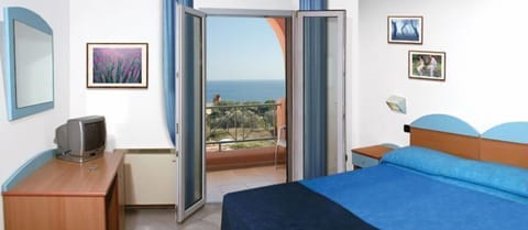 Double Room, Terrace, Sea View | Minibar, in-room safe, desk, cribs/infant beds
