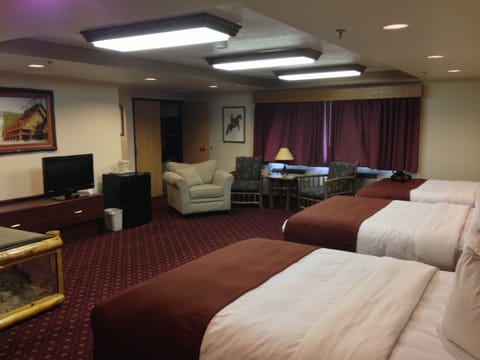 Suite, Multiple Beds, Non Smoking | In-room safe, soundproofing, iron/ironing board, free WiFi