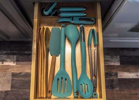 The kitchen is also fully stocked with utensils
