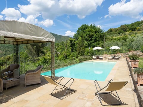 Cloud, Water, Plant, Sky, Property, Swimming Pool, Furniture, Chair, Azure, Outdoor Furniture