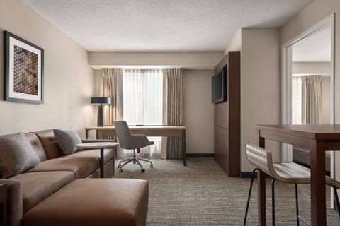 Suite, 1 Bedroom | Living room | 42-inch Smart TV with cable channels, TV, Netflix