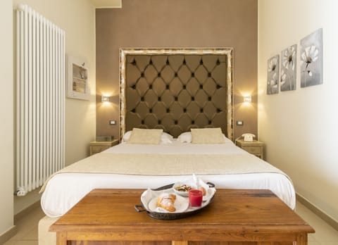 Deluxe Room, Balcony | Memory foam beds, minibar, in-room safe, individually furnished