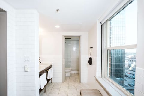 Room, 1 King Bed, Corner | Bathroom | Free toiletries, hair dryer, towels, soap