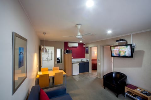 Suite, 2 Bedrooms | Living area | 32-inch LCD TV with satellite channels, TV