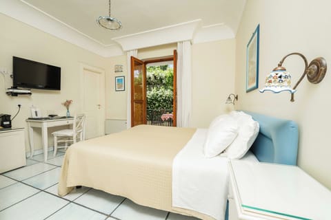 Standard Double or Twin Room | Minibar, in-room safe, desk, cribs/infant beds