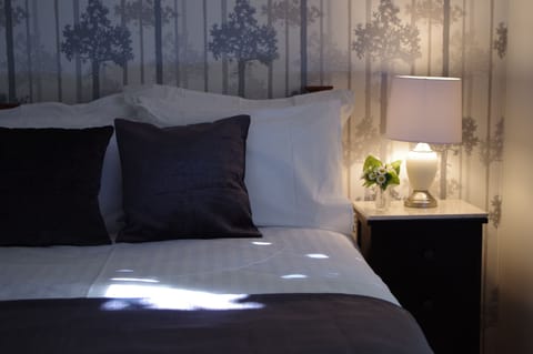 Zircon Room | Premium bedding, pillowtop beds, individually decorated