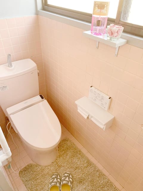 Separate tub and shower, free toiletries, hair dryer, slippers