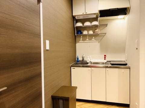 3 Bedrooms Apartment | Private kitchenette | Full-size fridge, microwave, stovetop, coffee/tea maker