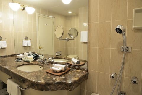 Combined shower/tub, eco-friendly toiletries, hair dryer, slippers