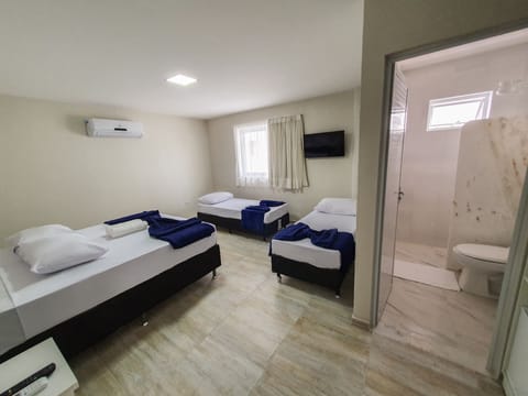 Comfort Quadruple Room | Minibar, free WiFi, bed sheets