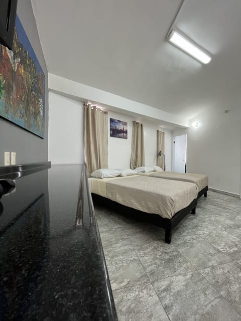 Family Triple Room, 1 Bedroom | Blackout drapes, soundproofing, iron/ironing board, free WiFi