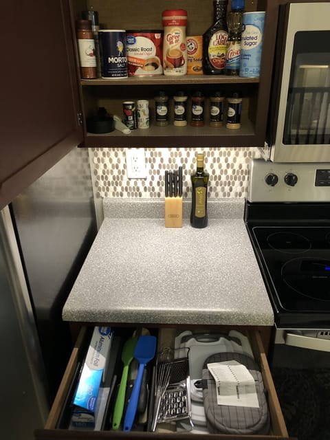 Additional cooking equipment, basic spices, oil, tin foil, & coffee supplies