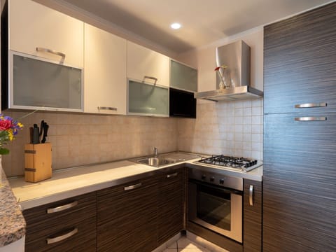 Water, Table, Tableware, Property, Sky, Furniture, Building, Window, Blue, Chair