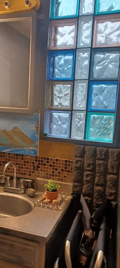 Bathroom. Colored glass block.  Looks nice. 