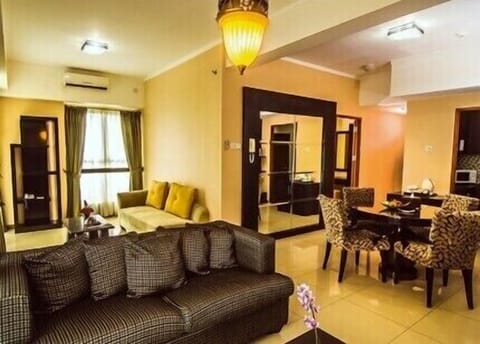 Suite | Living room | 26-inch LCD TV with satellite channels, TV