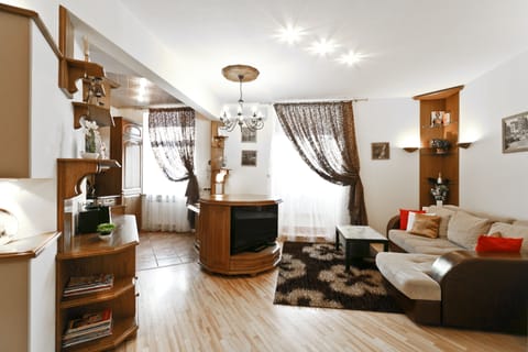 Apartment, 1 Bedroom | Living area | 50-inch LCD TV with satellite channels, TV, DVD player