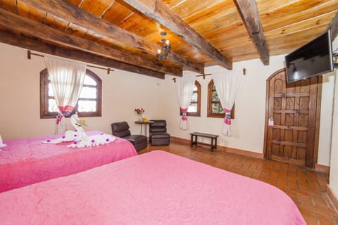 Standard Room, 2 Double Beds | Down comforters, in-room safe, individually decorated