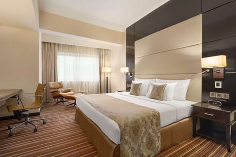 Suite, 1 King Bed, Non Smoking | Premium bedding, down comforters, pillowtop beds, minibar