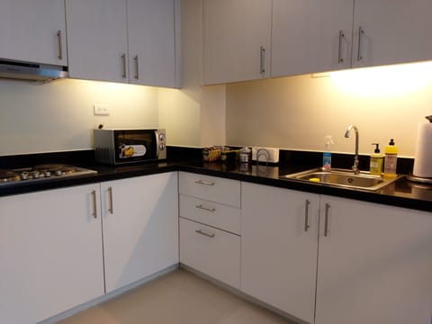 Condo, 2 Bedrooms | Private kitchen | Fridge, microwave, stovetop, electric kettle