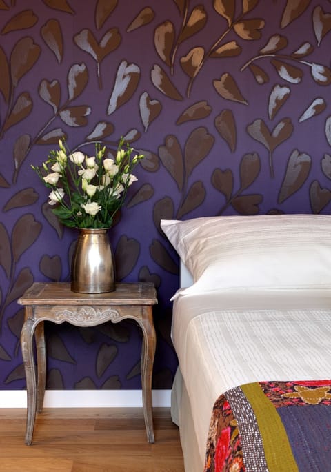 Premium bedding, down comforters, minibar, in-room safe