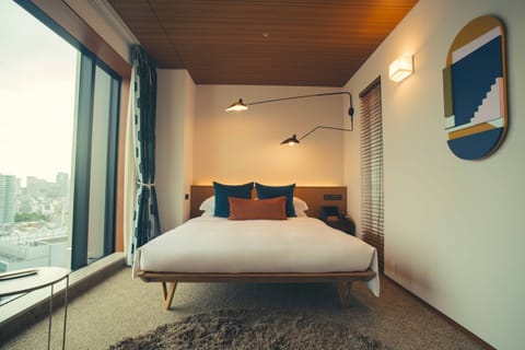 Premium bedding, down comforters, free minibar, in-room safe