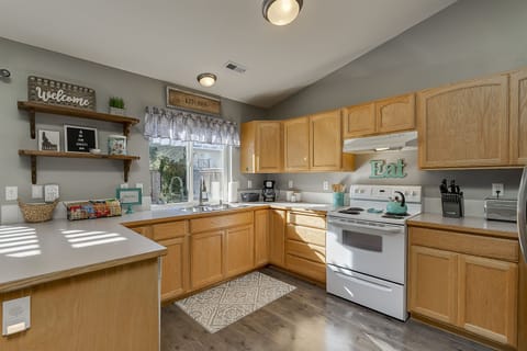 Kitchen stocked with all the amenities.