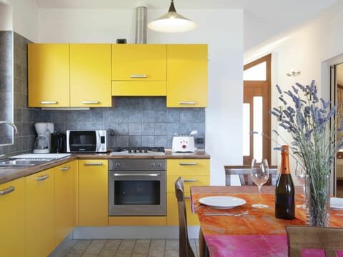 Countertop, Room, Cabinetry, Kitchen, Yellow, Furniture, Orange, Interior Design, Property, Building