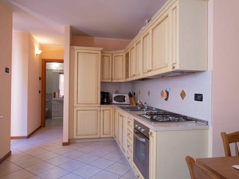 Property, Room, Furniture, Kitchen, Cabinetry, Countertop, Building, House, Interior Design, Floor