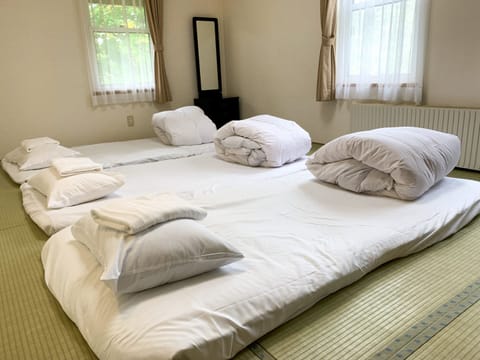 Japanese Style Room for 4 Guests, Shared Bathroom | Free WiFi, bed sheets