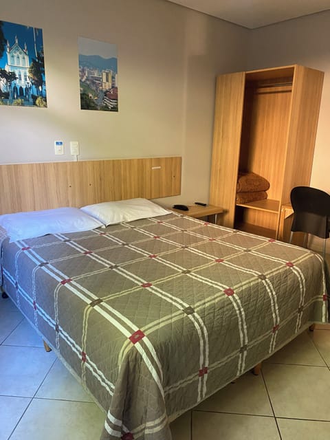 Economy Double Room | Minibar, laptop workspace, free WiFi, bed sheets