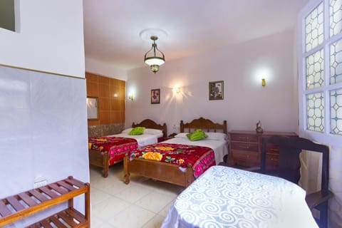 Quadruple Room | Minibar, iron/ironing board, WiFi, bed sheets