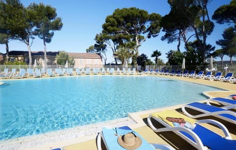 Lounge around the pool after a day of adventure.