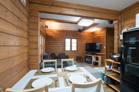 Basic 2-Bedroom Cottage | Living area | 50-inch TV with digital channels, Netflix, streaming services