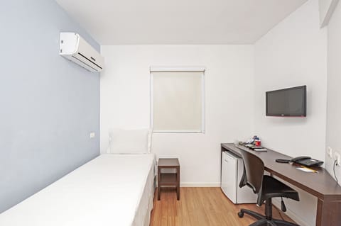 Single Room | Minibar, laptop workspace, blackout drapes, free WiFi