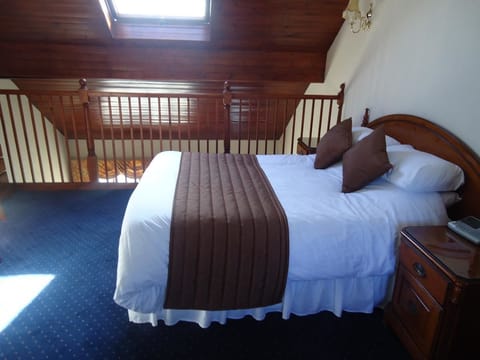 Suite, 1 Bedroom, Mezzanine | Desk, iron/ironing board, free WiFi, bed sheets