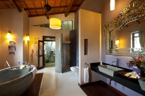 Separate tub and shower, deep soaking tub, designer toiletries