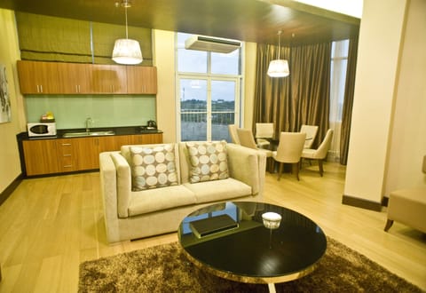 Penthouse | Living area | 32-inch LCD TV with cable channels, TV