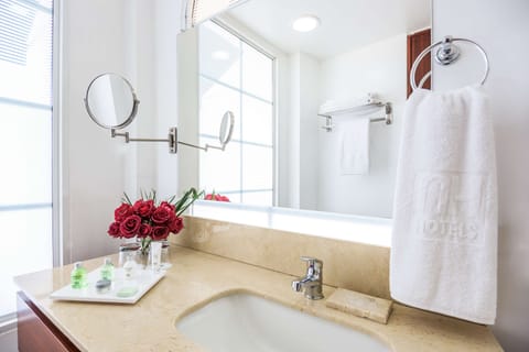 Shower, eco-friendly toiletries, hair dryer, towels