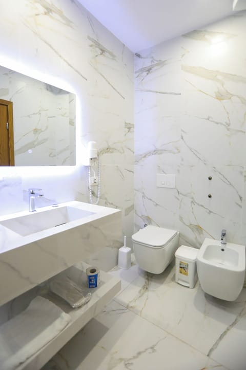 Standard Triple Room, Sea View | Bathroom | Combined shower/tub, free toiletries, hair dryer, bathrobes