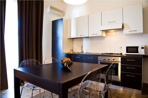 Superior Apartment, 1 Bedroom, Sea View | Private kitchen | Full-size fridge, microwave, stovetop, coffee/tea maker