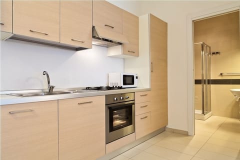 Apartment, Non Smoking | Private kitchen | Full-size fridge, microwave, stovetop, coffee/tea maker