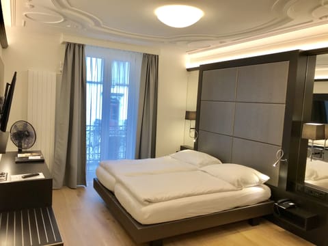 Deluxe Design Double Room | Premium bedding, in-room safe, desk, blackout drapes
