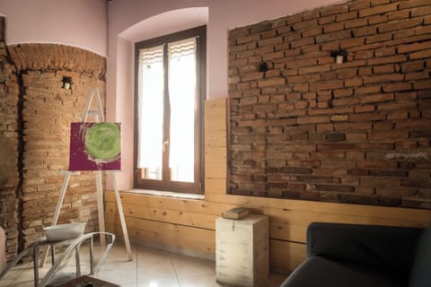 Deluxe Apartment, Kitchen | Living area | 24-inch flat-screen TV with digital channels