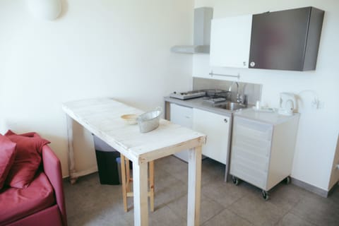 Deluxe Apartment, Kitchen | Private kitchen | Espresso maker, coffee/tea maker, electric kettle