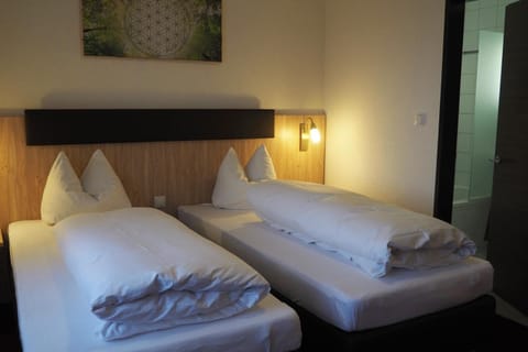 Hypo-allergenic bedding, down comforters, memory foam beds, in-room safe